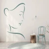 Decorative face sticker 2029 - Room arrangement with light-colored walls and minimalist furniture.