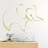 Decorative elephant sticker 2014 - Styled in a room with light walls and minimalist natural-toned furniture.
