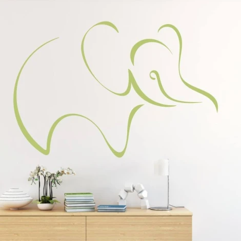 Decorative elephant sticker 2014 - Styled in a room with light walls and minimalist natural-toned furniture.