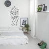Tiger decorative sticker 2015 - Bedroom decor with light walls, minimalist furniture, and greenery.
