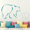 Bear sticker 2001 - Decor for a child\'s room. Light-colored walls, pillows in various patterns.