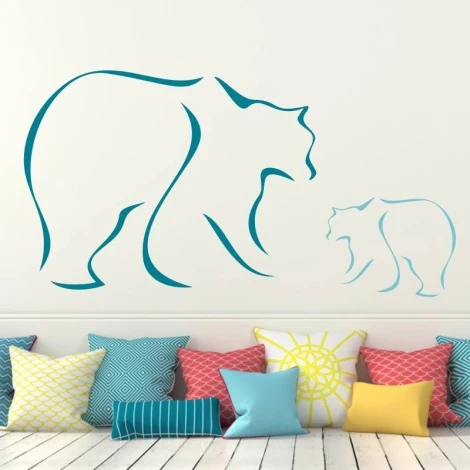 Bear sticker 2001 - Decor for a child\'s room. Light-colored walls, pillows in various patterns.