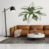 Flower sticker 2046 - Living room setup with light-colored walls, brown sofa, and black lamp.