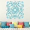 Ornament sticker 2071 - Graphic design featuring a symmetrical floral motif in shades of blue.