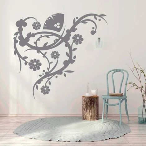 Decorative branch sticker 2123 - Room arrangement with light walls, wooden floor, and blue chair.