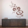 Decorative flower sticker 2113 - Living room setup with light-colored wall and dark furniture.