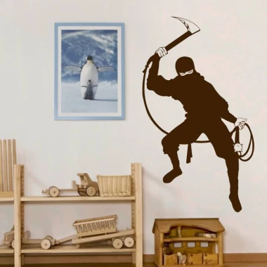Ninja wall sticker 2100 - Decor for a children\'s room with light-colored walls and simple wooden furniture.