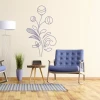 Floral sticker decoration 2142 - Living room setup with light walls, wooden floor, and blue furniture.
