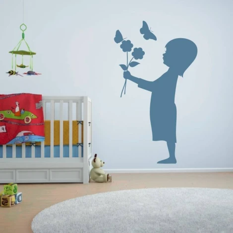 Girl sticker with flowers 2140 - Decor for a child\'s room. Light-colored walls and simple style furniture.