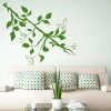Branch sticker 2147 - Living room decor with light-colored walls and beige and green furniture.