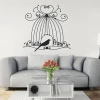 Bird in cage sticker 2141 - Living room decor. Gray walls and light furniture.