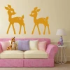 Deer sticker 2139 - Decor for a child\'s room. Light-colored walls, pink sofa.