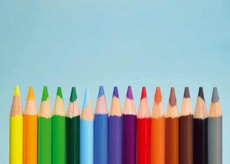 Magnetic dry-erase board with colored parallel crayons on a blue background. Design 247.