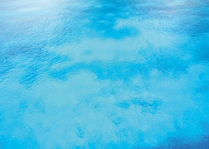Caribbean 252 Dry Erase Board - Blue surface with subtle wavy patterns.
