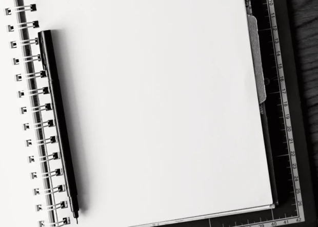 Magnetic dry-erase board planner 260 - Graphic design. White surface with a black pen beside it.