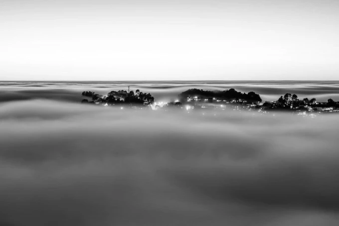 Wall mural of fog rising over the city FP 1517 - Graphic design. Gray, blurred shapes with city elements.