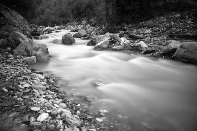 Wall mural magical river FP 1663 - Graphic design featuring a river with stones in black and white tones.