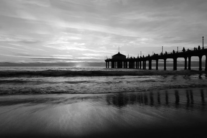 Wall mural of a beautiful pier at sunset FP 1679 - Graphic design. Pier silhouette against waves.