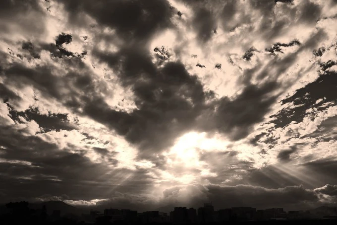 Wall mural of the sun breaking through clouds FP 1748 - Graphic design featuring various cloud patterns.