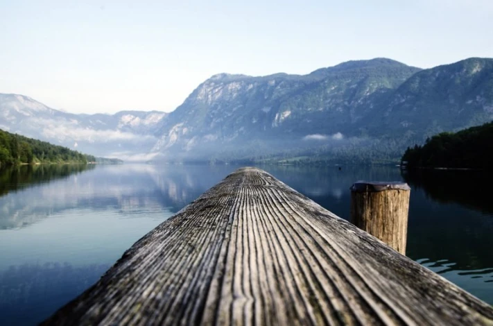 Wooden pier wallpaper with a lake view FP 1826 - Graphic design featuring a pier along the lake and mountains in the background.