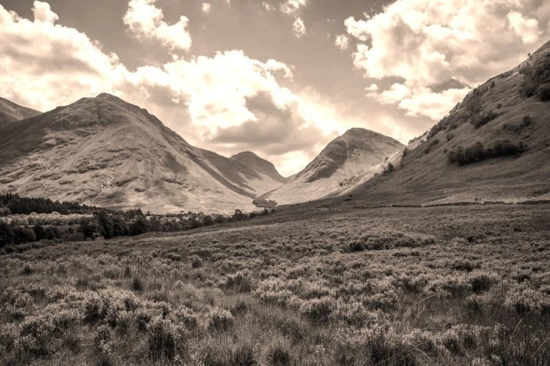 Wall mural delicate mountain face FP 1885 - Graphic design. Mountains in various shades of gray with clouds.