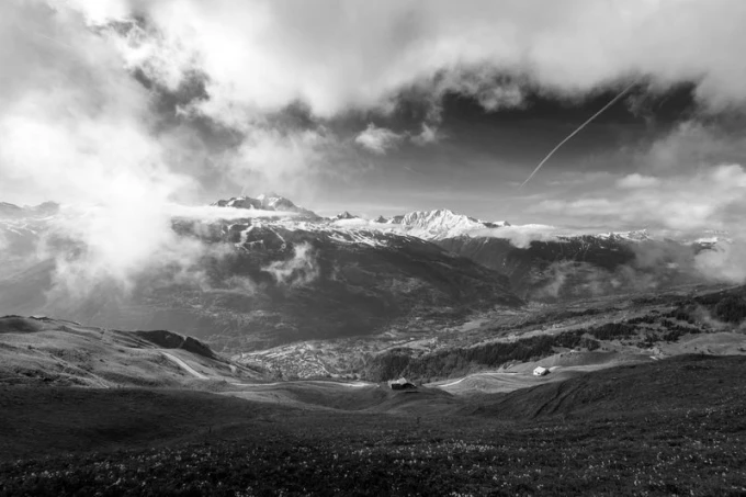 Wall mural featuring a stunning view of meadows, mountains, clouds, and valleys - Graphic design FP 1939.