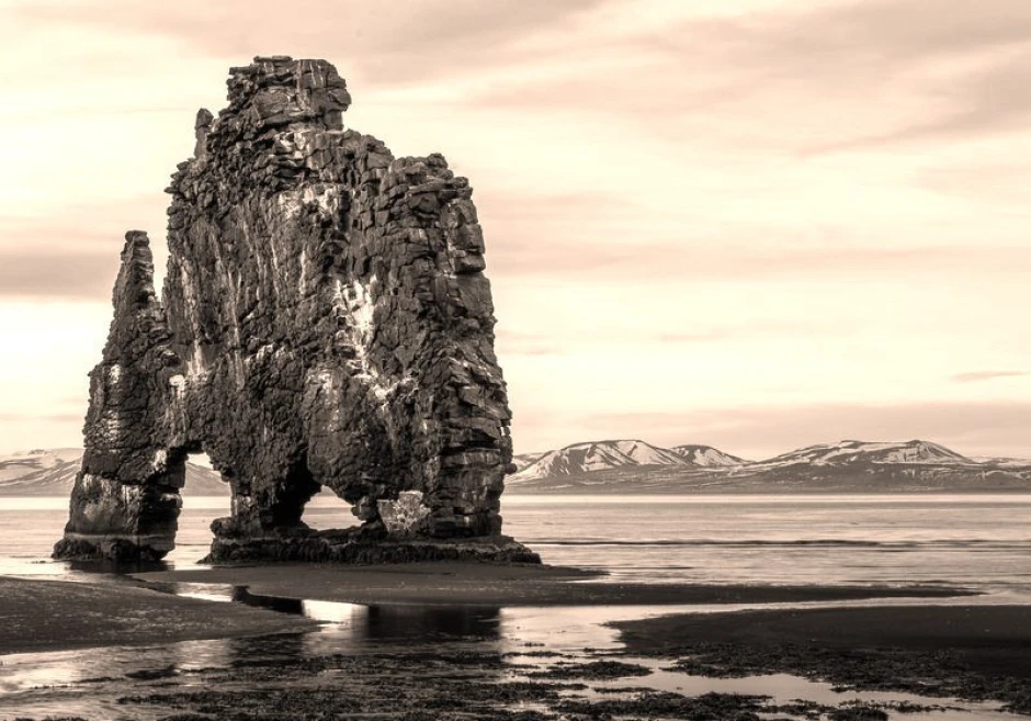 Wall mural of a solitary rock FP 2034 - Graphic design featuring an irregularly shaped rock in monochromatic tones.