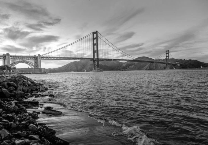 Red hanging bridge wall mural FP 2151 - Graphic design featuring a bridge with large spans, mountains, and clouds in the background.