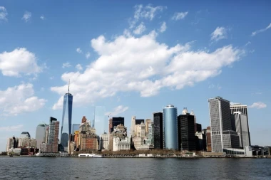 Wall mural of stunning New York FP 2166 - Graphic design featuring a city skyline with skyscrapers and clouds.