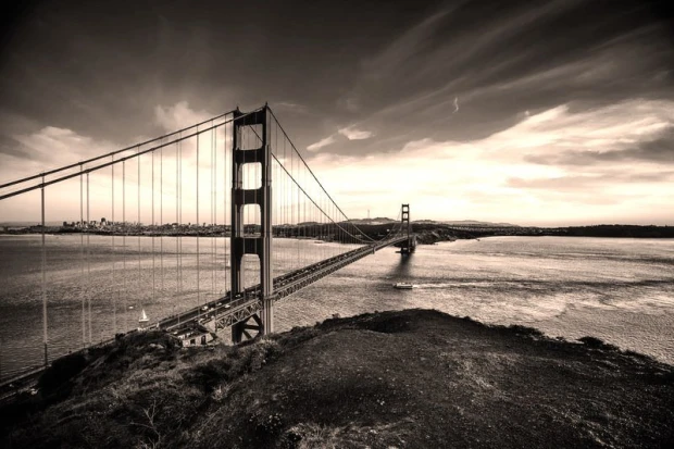 Wall mural Golden Gate view of the bridge FP 2255 - Graphic design. Suspension bridge over water with city in the background.