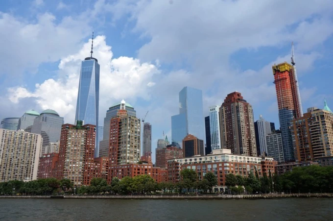City skyline wallpaper from a ship FP 2269 - Graphic design featuring tall buildings and clouds.