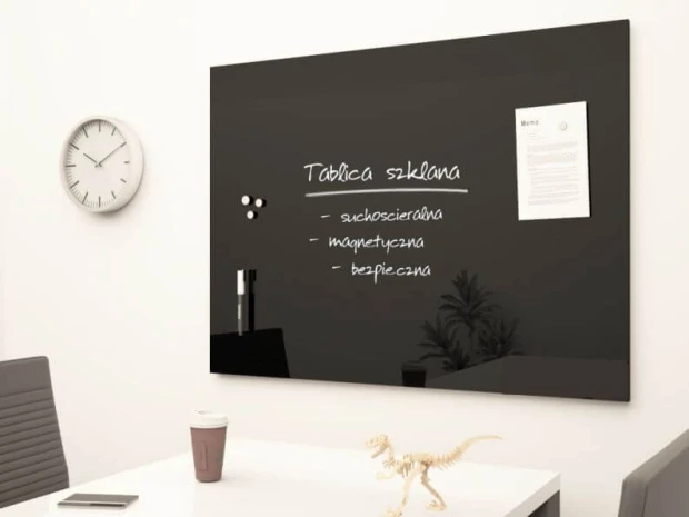 Black magnetic glass board 100x180cm - Office setup with light-colored walls, table, and chairs.