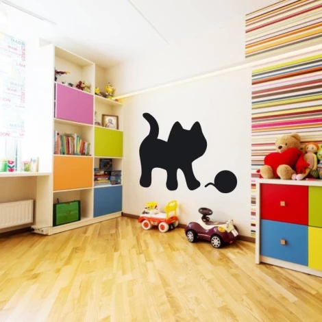 Chalk sticker for kids featuring a small kitten, perfect for bright children\'s rooms with wooden floors.