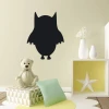 Chalk sticker for kids featuring an owl - perfect for a child\'s room with light walls and neutral furniture.