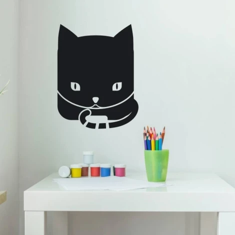 Chalk sticker for kids featuring a black cat with big eyes holding a pencil.