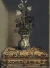 Reproduction of Flowers in a Jug by Hans Memling, styled in an interior with a wooden table and colorful tablecloth.