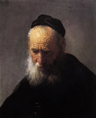 Reproduction of Rembrandt\'s Head of an Old Man. The image features an elderly man with a gray beard and wrinkles, in dark tones.
