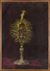 Reproduction of the Reliquary with the Nail of the Holy Cross by Leon Wyczółkowski. The image features a golden reliquary.