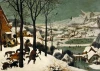 Reproduction of The Hunters in the Snow by Pieter Bruegel. Bright walls and wooden decor in a living room setting.