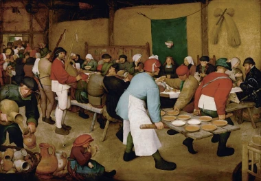 Reproduction of The Peasant Wedding by Pieter Bruegel - Decor in a rustic cottage with beige walls and wooden furniture.