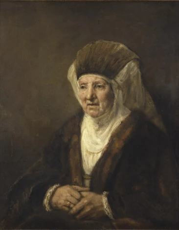 Reproduction of Rembrandt\'s Portrait of an Old Woman. The image depicts an elderly woman in dark clothing.