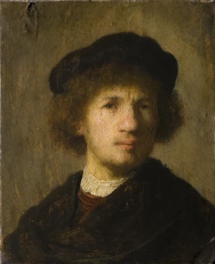 Self-portrait reproduction by Rembrandt. The image features a man with curly hair and a hat.