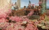 Reproduction of The Roses of Heliogabalus by Lawrence Alma-Tadema - Graphic design featuring flowers in shades of pink and figures.