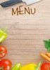 Chalkboard menu board 027 - Graphic design featuring vegetables and the word MENU on a wooden background.