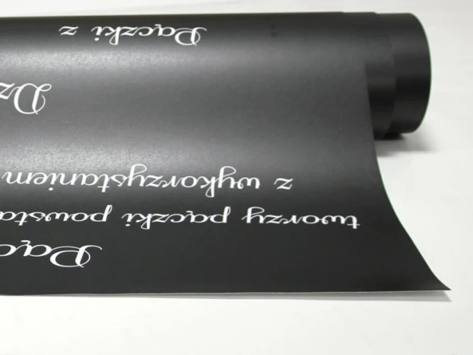 Chalkboard menu sign 001 - Graphic design. Black paper with white stylized text.