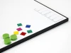 Custom dry-erase magnetic board in an aluminum frame - Graphic design. Simple white surface with colorful accents.