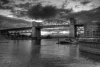 Wall mural of a steel bridge against a colorful sky FP 3240 - Graphic design featuring an arched bridge over water and clouds.