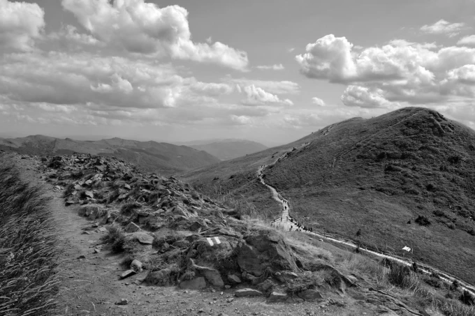 Wall mural Bieszczady trails FP 3459 - Graphic design featuring mountain paths, stones, and clouds.