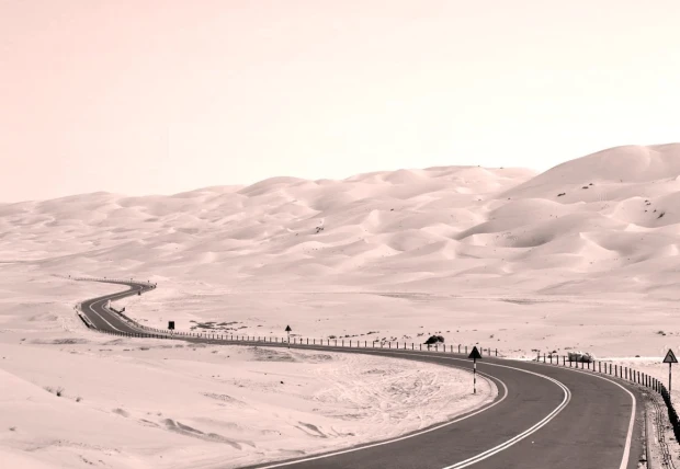 Desert road wallpaper FP 3422 - Graphic design with a winding road surrounded by sandy dunes.