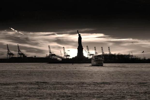 Wall mural of the Statue of Liberty FP 3475 - Graphic design featuring the silhouette against water and clouds.